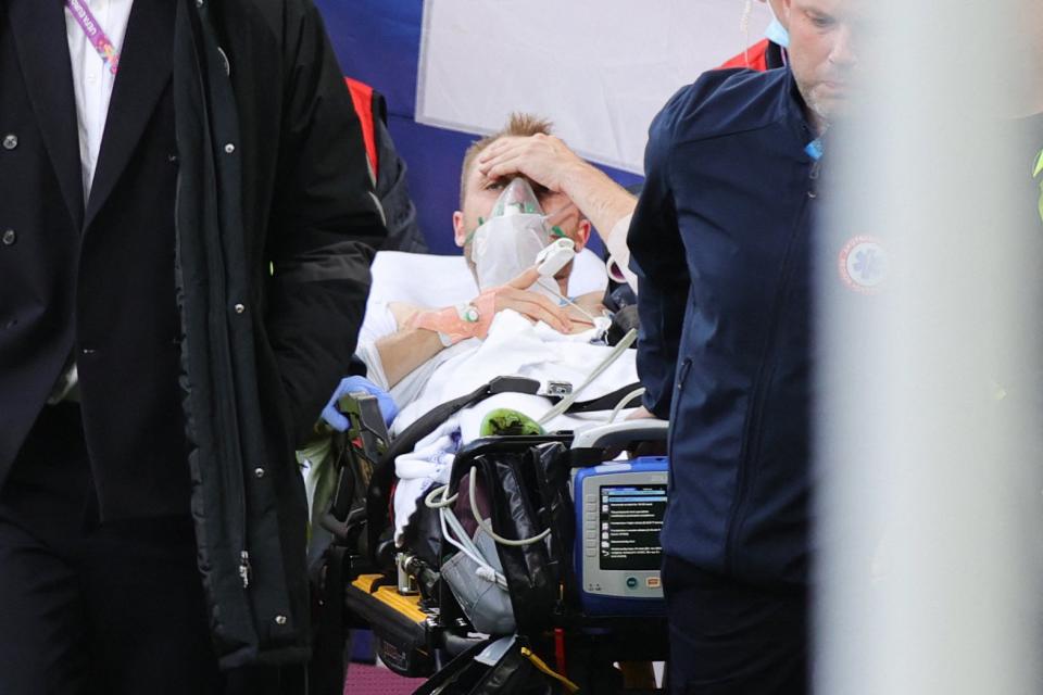 Eriksen regained consciousness before leaving the field (AFP via Getty Images)