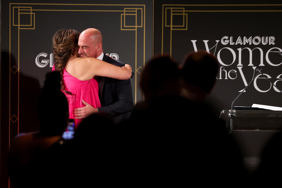 Mariska Hargitay (L) and Chris Meloni hug during Glamour Celebrates 2021 Women of the Year Awards. (Cindy Ord / Getty Images for Glamour)