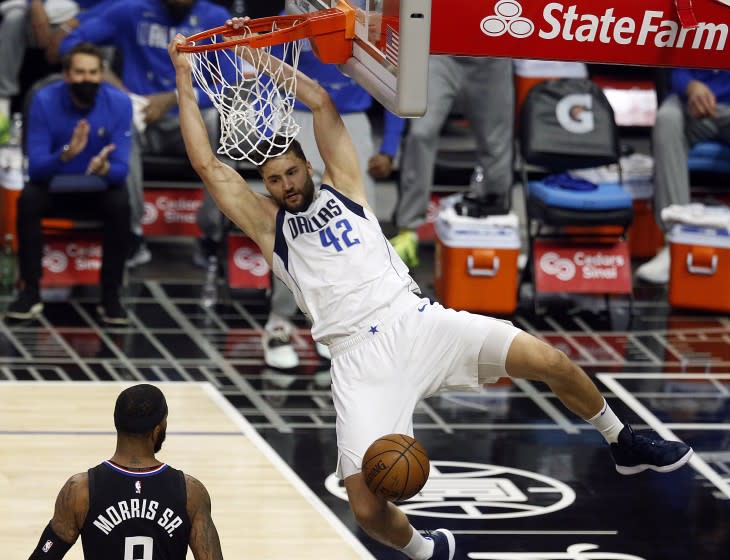 LOS ANGELES, CA - MAY 25: Dallas Mavericks forward Maxi Kleber (42) slam dunks the ball in a game against the LA Clippers in the first period at the Staples Center on Tuesday, May 25, 2021 in Los Angeles, CA. Game two of the NBA Western Conference first-round playoff series. (Gary Coronado / Los Angeles Times)