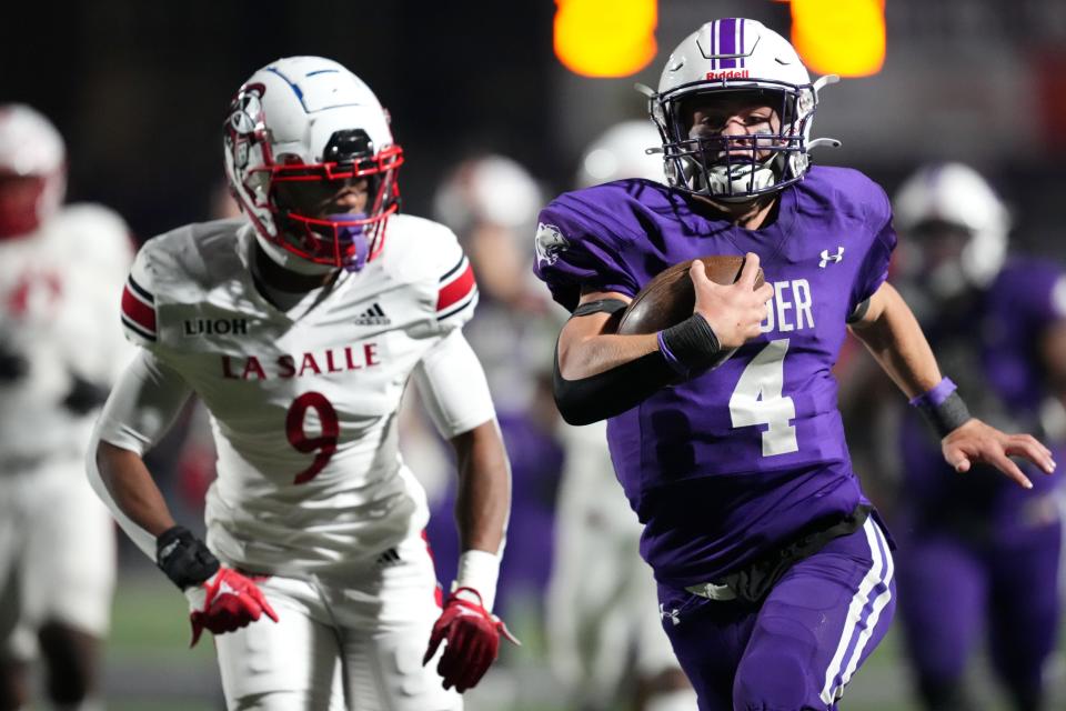 La Salle defensive back Koy Beasley, left, playing against Elder in 2022, is an ESPN top 300 athlete who will attend the Under Armour Next Football Camp Series in Columbus.