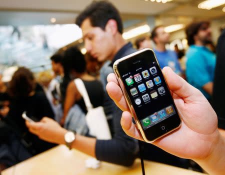 FILE PHOTO -- The new iPhone is seen inside the Apple Store in New York, June 29, 2007. Hundreds lined up on Friday outside the Apple store hours before the iPhone, a combination widescreen iPod, cellphone and pocket Internet device, went on sale at Apple's 164 stores and nearly 1,800 AT&T stores. REUTERS/Shannon Stapleton/File Photo