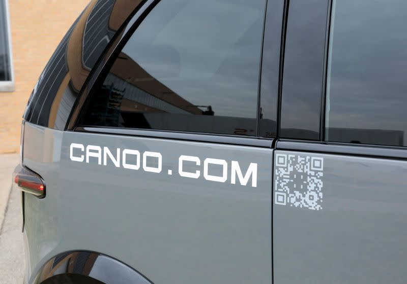 FILE PHOTO: A view shows the Canoo logo on a Canoo LV (Lifestyle Vehicle) electric vehicle