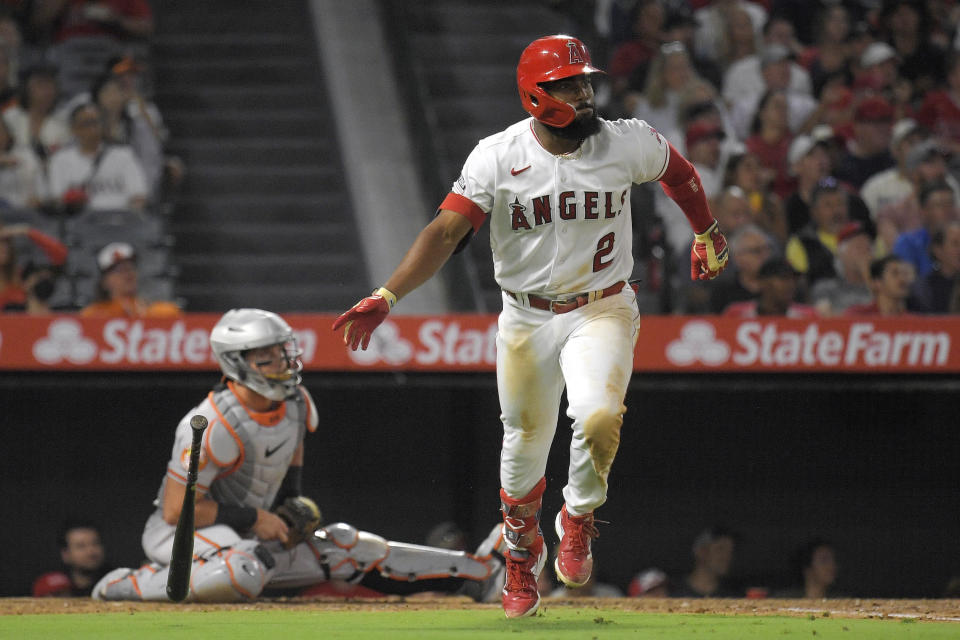 Los Angeles Angels' Luis Rengifo, right, heads to first for a two-run home run as Baltimore Orioles catcher James McCann watches during the third inning of a baseball game Wednesday, Sept. 6, 2023, in Anaheim, Calif. (AP Photo/Mark J. Terrill)