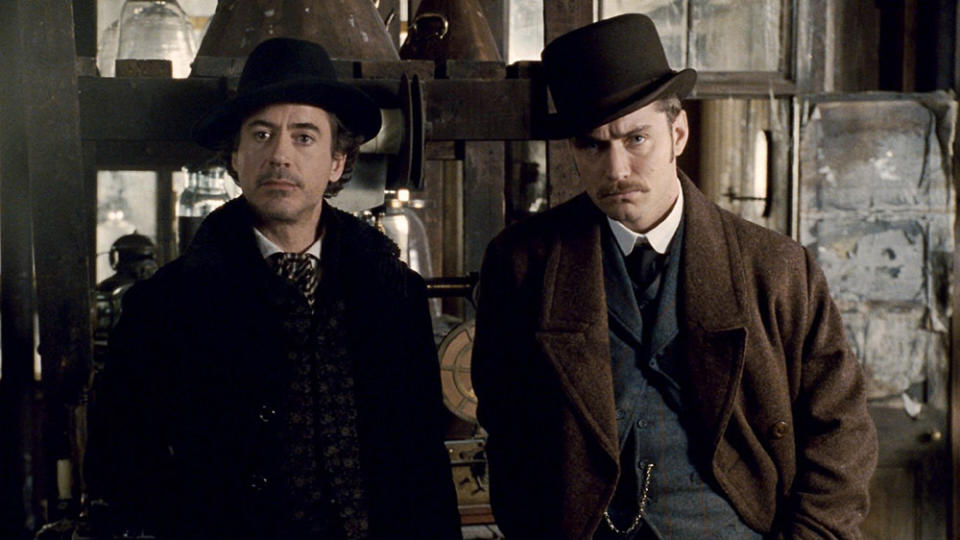 Downey Jr and Jude Law in Sherlock Holmes (Credit: Warner Bros)