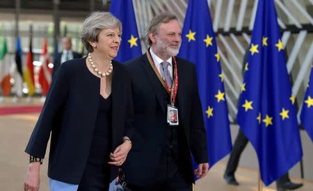 British Prime Minister Theresa May and UK ambassador tot the EU Tim Barrow arrivecat the EU summit in Brussels, Belgium, June 22, 2017. REUTERS/Gonzalo Fuentes