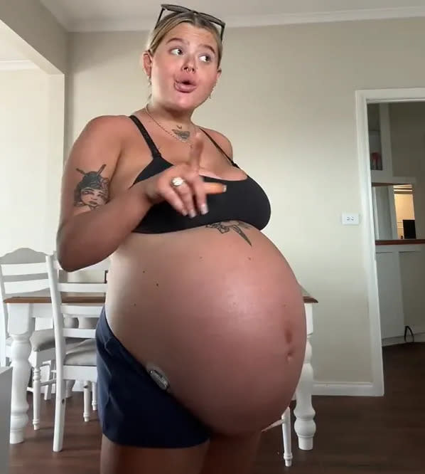 <strong>澳洲一位媽媽愛麗莎分享生活趣事，也讓網友看見她的8個月超大孕肚。（圖／翻攝自TikTok@pettybitc.hh）</strong>