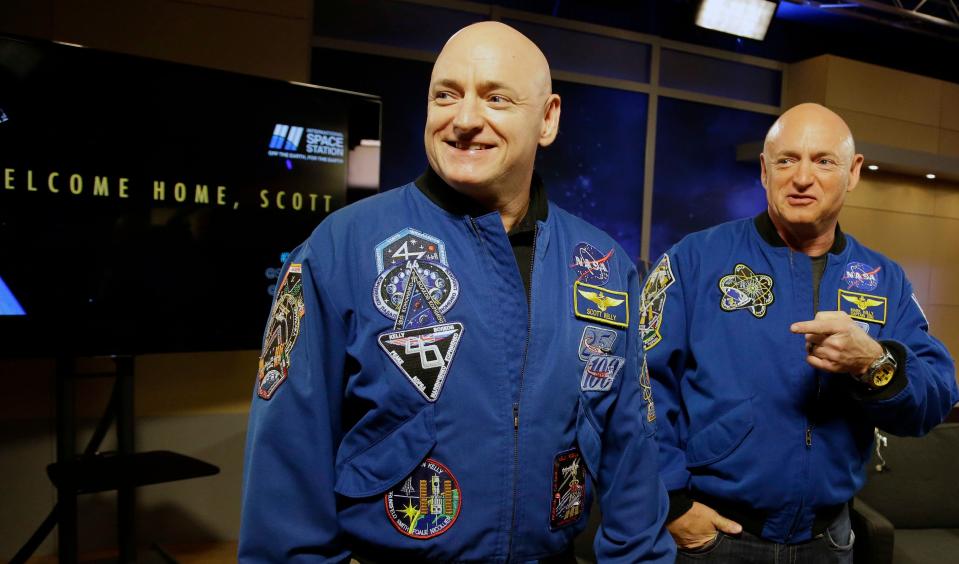 Double vision? NASA astronaut Scott Kelly, left, and