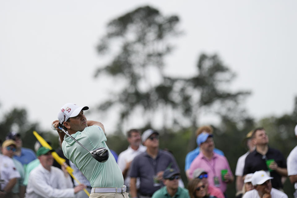 Sergio Garcia, of Spain, watches his tee shot on the eighth hole during the first round of the Masters golf tournament at Augusta National Golf Club on Thursday, April 6, 2023, in Augusta, Ga. (AP Photo/David J. Phillip)