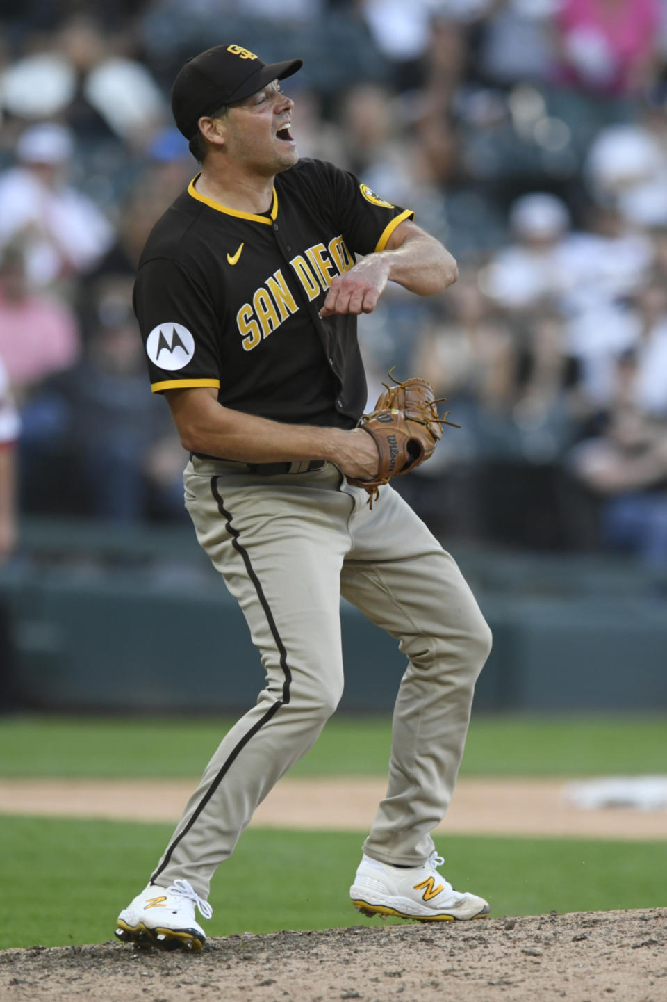 San Diego Padres closing pitcher Rich Hill celebrates after defeating the Chicago White Sox in 11 innings of a baseball game Sunday, Oct. 1, 2023, in Chicago. (AP Photo/Paul Beaty)