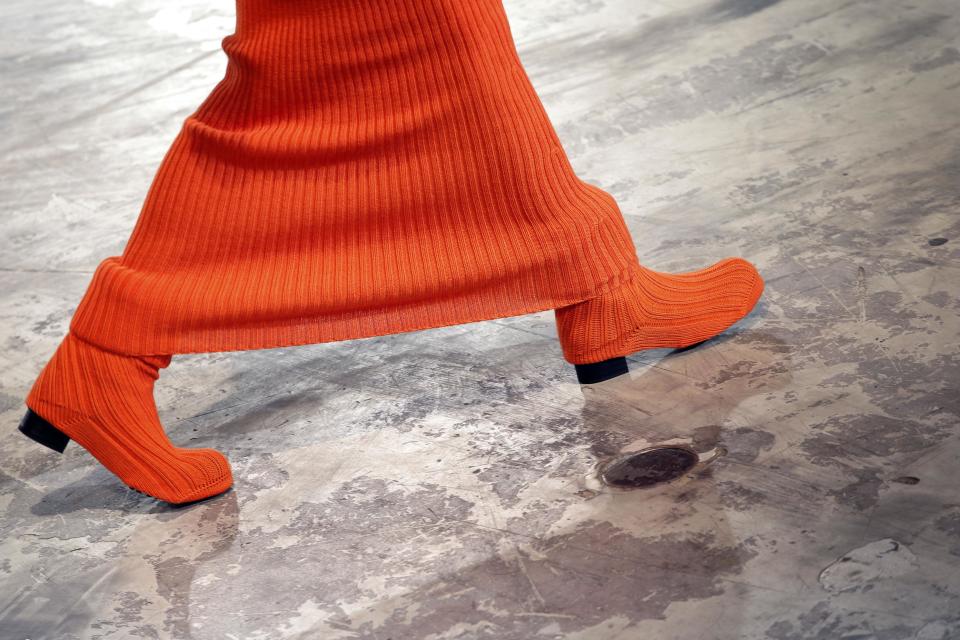 A model wears a creation by Japanese fashion designer Yohji Yamamoto for his Fall/Winter 2013-2014 ready to wear collection, in Paris, Friday, March 1, 2013. (AP Photo/Christophe Ena)