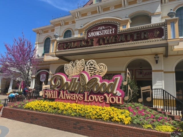 An image of Dollywood branding in front of the Palace Theater at the theme park.