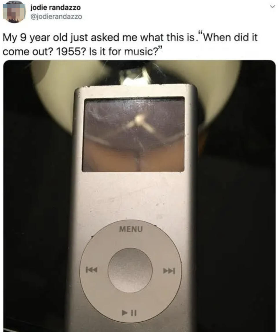 Close-up of an iPod Nano with text: "My 9 year old just asked me what this is. 'When did it come out? 1955? Is it for music?'" tweeted by Jodie Randazzo