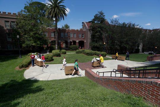 Students and their families move in to dorms during move-in day at Florida State University Thursday, August 22, 2019.