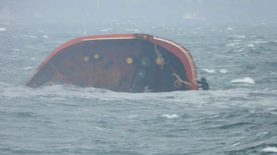 A handout photo released by the Philippine Coast Guard shows the tip of MT Terra Nova protruding in Manila Bay, Philippines, July 25, 2024. - Philippine Coast Guard/Reuters