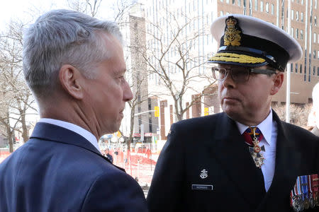 Liberal MP Andrew Leslie greets Vice-Admiral Mark Norman as he arrives at the courthouse in Ottawa, Ontario, Canada, May 8, 2019. REUTERS/Chris Wattie