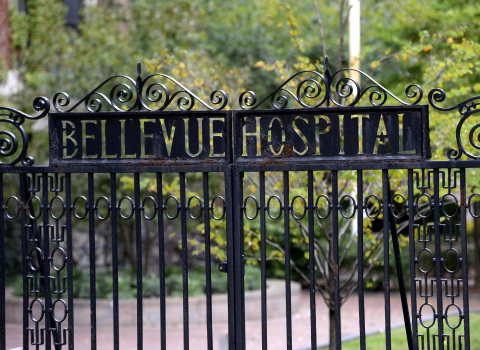 A sign on the gate for the entrance to Bellevue Hospital is viewed on October 24, 2014 in New York, the morning after it was confirmed that Craig Spencer, a member of Doctors Without Borders, who recently returned to New York from West Africa tested positive for Ebola.