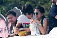 Kathryn Bernardo and Daniel Padilla are seen together at the float of the MMFF 2012 entry, "Sisterekas" during the 2012 Metro Manila Film Festival Parade of Stars on 23 December 2012. (Angela Galia/NPPA Images)