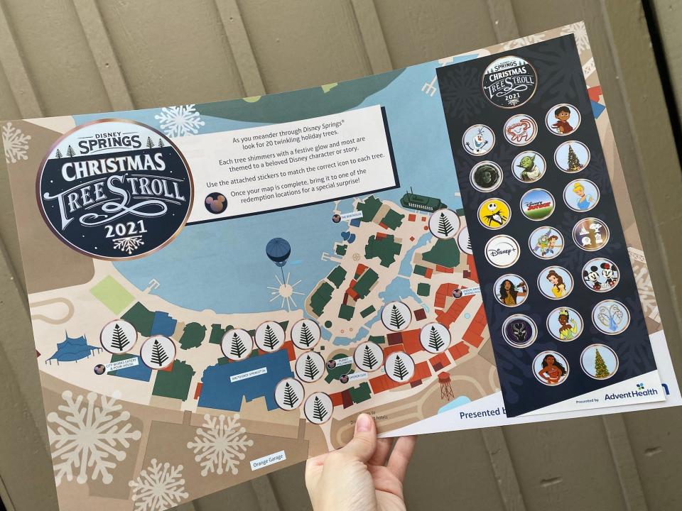 A photo of the Disney Springs Christmas Tree Stroll map.