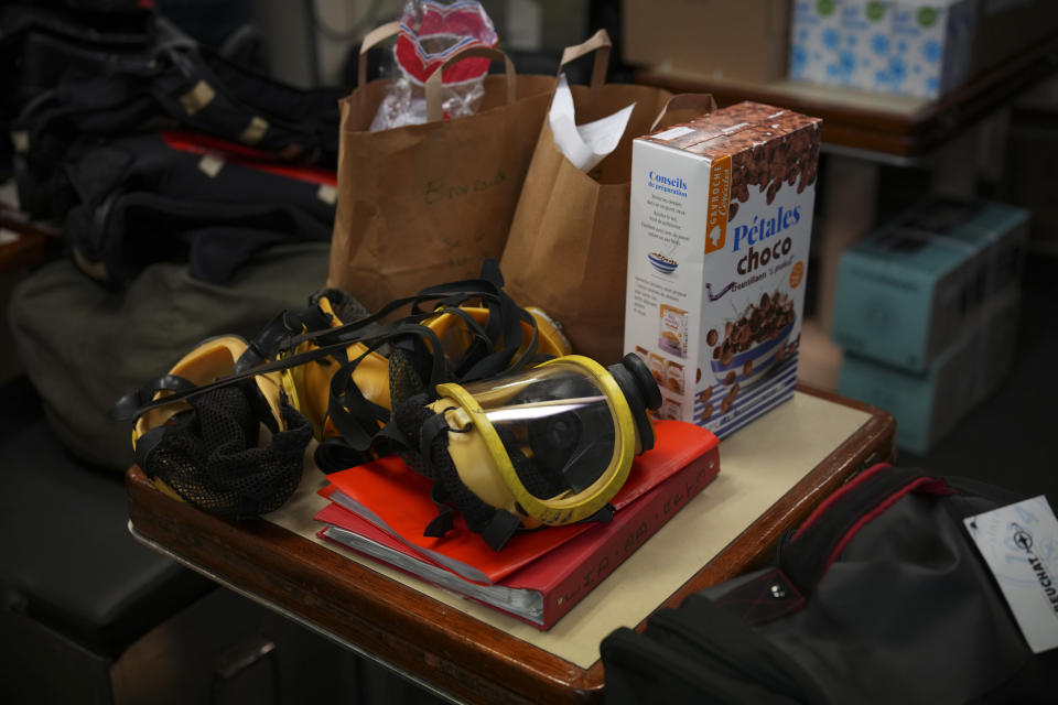 Equipment and food to be stored away is pictured on a French Rubis-class submarine at the Toulon naval base in southern France, Monday, April 15, 2024. The nuclear powered submarine will be guarding France's Charles de Gaulle aircraft carrier during training exercises dubbed Neptune Strike in the Mediterranean with the 32-nation NATO military alliance. (AP Photo/Daniel Cole)