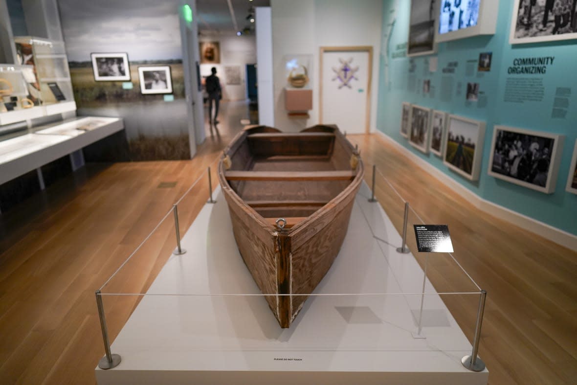 Guests tour the International African American Museum on Friday, June 23, 2023, in Charleston, S.C. Overlooking the old wharf at which nearly half of the enslaved population first entered North America, the 150,000-square foot museum houses exhibits and artifacts exploring how African Americans’ labor, perseverance, resistance and cultures shaped the Carolinas, the nation and the world. (AP Photo/Chris Carlson)