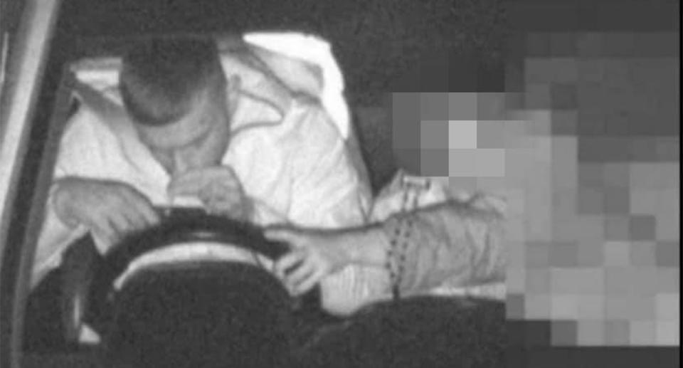 A driver was captured on a mobile phone detection camera appearing to sniff a substance off his phone. Source: NSW Police