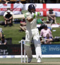 England's Jos Buttler bats during play on day two of the first cricket test between England and New Zealand at Bay Oval in Mount Maunganui, New Zealand, Friday, Nov. 22, 2019. (AP Photo/Mark Baker)