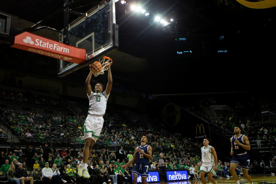 Oregon guard Kwame Evans Jr. dunks the ball as the Oregon Ducks host UTEP Saturday, Dec. 9, 2023, at Matthew Knight Arena in Eugene, Ore.
