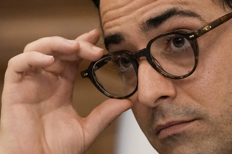 French Foreign Minister Stephane Sejourne adjusts his glasses as he listens to a question during a press conference at the Pine Palace, which is the residence of the French ambassador, in Beirut, Lebanon, Sunday, April 28, 2024. (AP Photo/Hassan Ammar)