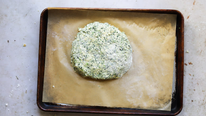 unbaked spinach scone dough on sheet tray