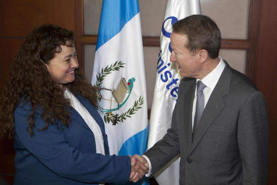 Guatemala's Attorney General Claudia Paz y Paz, left, and Assistant Secretary of State for International Narcotics and Law Enforcement Affairs (INL) William R. Brownfield shakes hands during a photo opportunity in Guatemala City, Monday, Feb. 10, 2014. Brownfield is in an official visit to Guatemala and Honduras this week. (AP Photo/Moises Castillo)