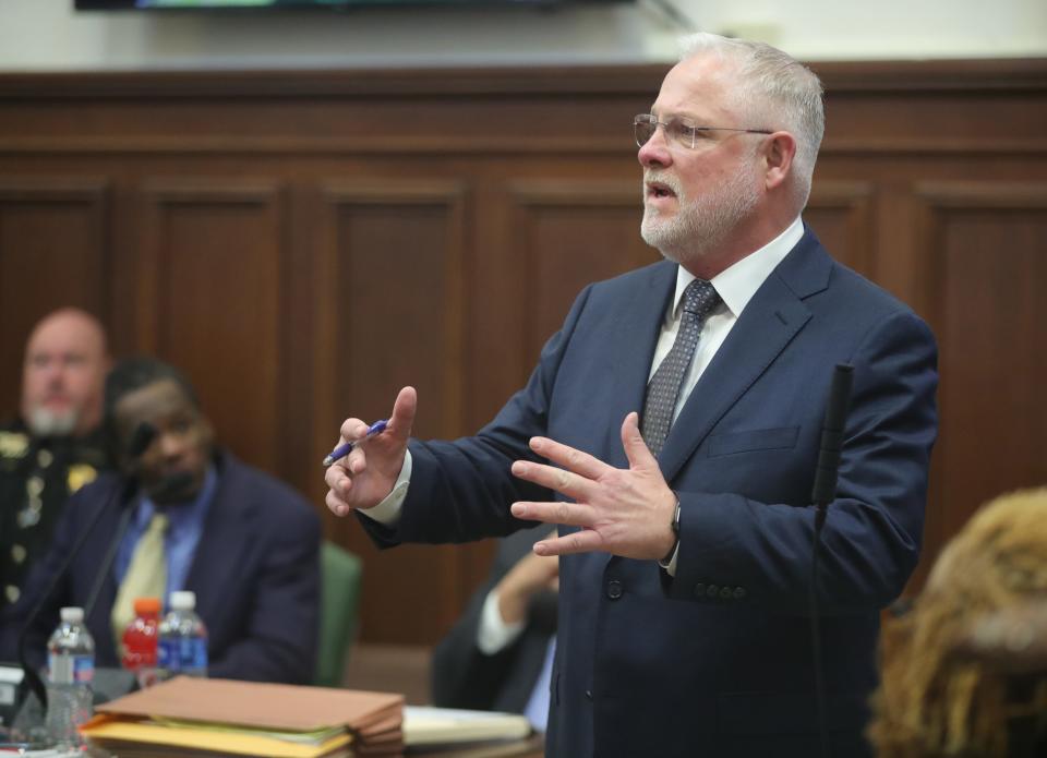 Defense attorney Nathan Ray delivers opening remarks to the jury Wednesday during the retrial of Leon Newsome in Akron.