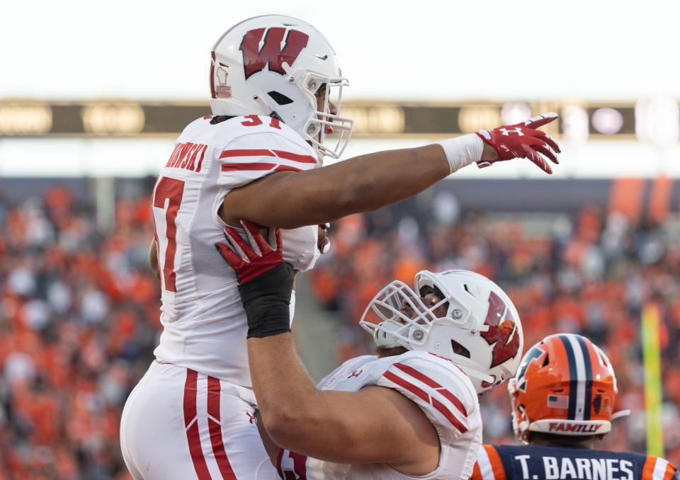 CHAMPAIGN, ILLINOIS – OCTOBER 21: Riley Nowakowski #37 of the Wisconsin Badgers celebrates a two point conversion during the second half against the Illinois Fighting Illini at Memorial Stadium on October 21, 2023 in Champaign, Illinois. (Photo by Michael Hickey/Getty Images)