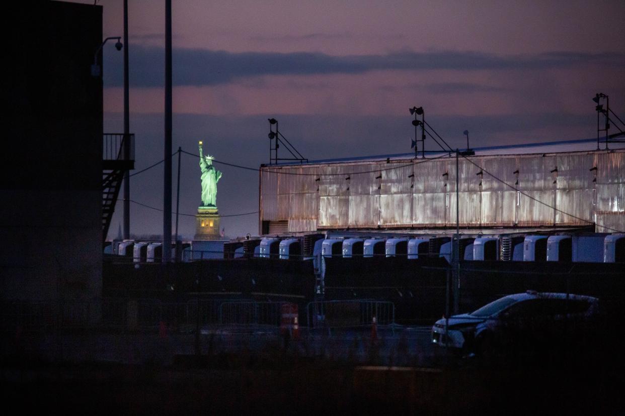 A COVID-19 disaster morgue made up of refrigerated trailers stands at the South Brooklyn Marine Terminal during the COVID-19 pandemic in the Brooklyn borough of New York, United States, Dec. 14, 2020. (Photo by Michael Nagle/Xinhua via Getty) 