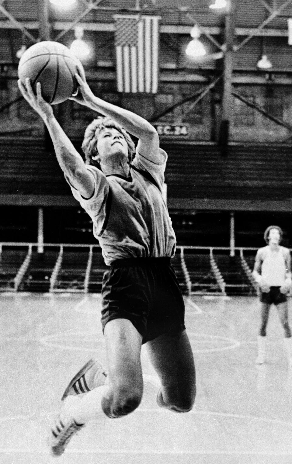FILE - Ann Meyers drives during practice at the NBA rookie camp for the Indiana Pacers in Indianapolis, Sept. 10, 1978. Greats like Ann Meyers Drysdale laid the foundation for the heights the game has reached in 2024. (AP Photo/File)