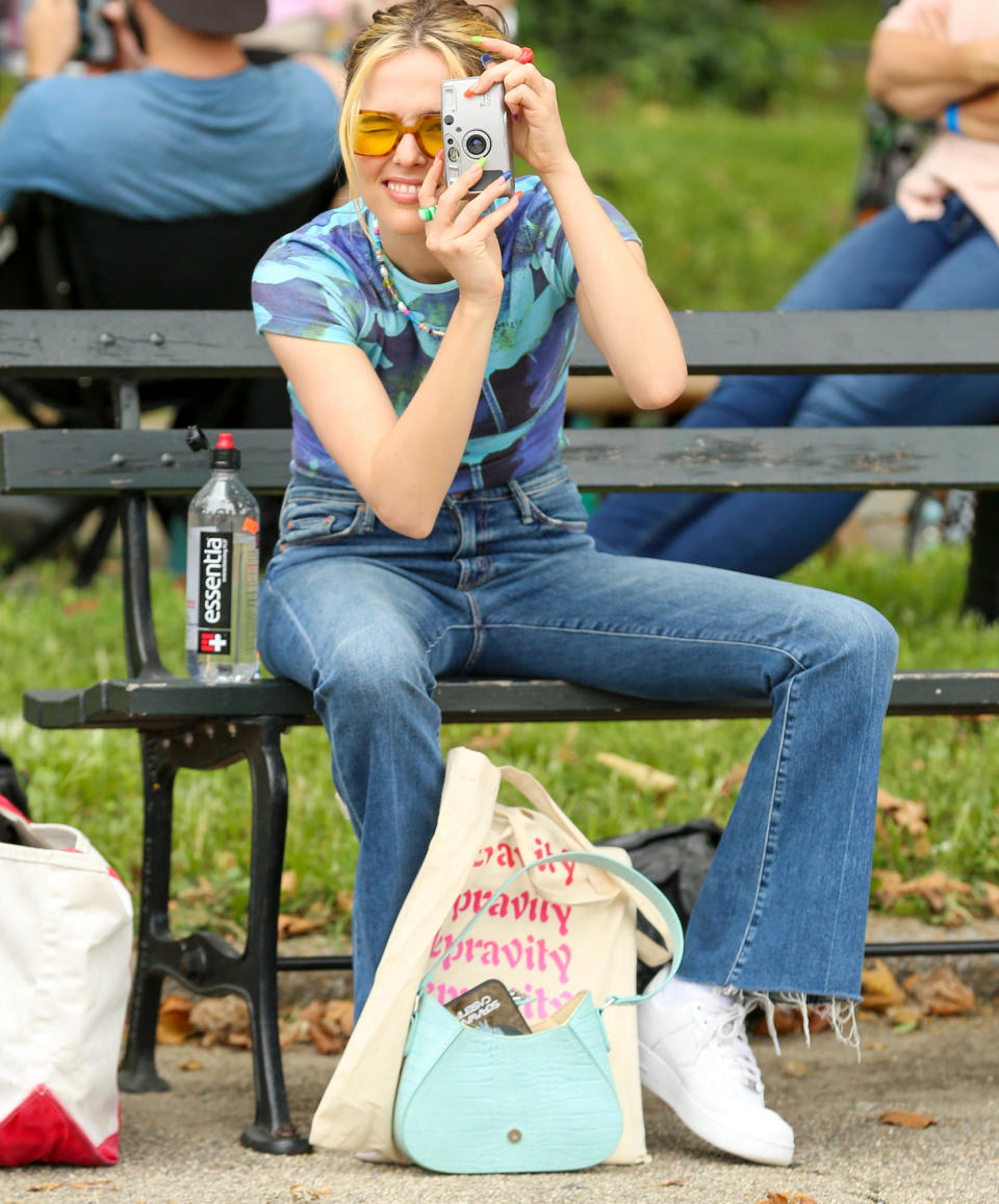 <p>Zoey Deutch is seen on the set of <em>Not Okay</em> snapping photos on Aug. 17 in N.Y.C.</p>