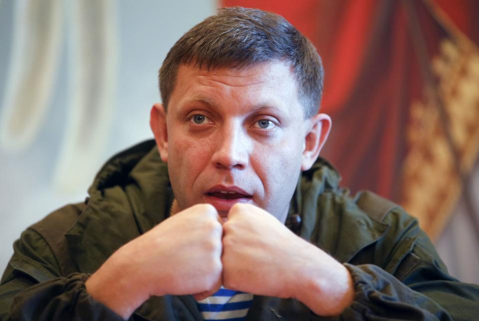 Alexander Zakharchenko, separatist leader of the self-proclaimed Donetsk People's Republic, speaks to the media during a visit to Makeevskiy coking plant in Makiivka, outside Donetsk, October 29, 2014. Ukraine on Tuesday condemned as "destructive and provocative" Russia's stance towards elections organised by pro-Russian separatists in eastern Ukraine next Sunday, saying Moscow's recognition of the vote could wreck chances of bringing peace. REUTERS/Maxim Zmeyev (RUSSIA - Tags: POLITICS CIVIL UNREST ELECTIONS)