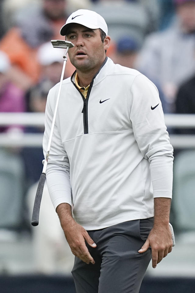 Scottie Scheffler reacts after missing a putt on the 16th hole during the third round of the PGA Championship golf tournament at Oak Hill Country Club on Saturday, May 20, 2023, in Pittsford, N.Y. (AP Photo/Eric Gay)