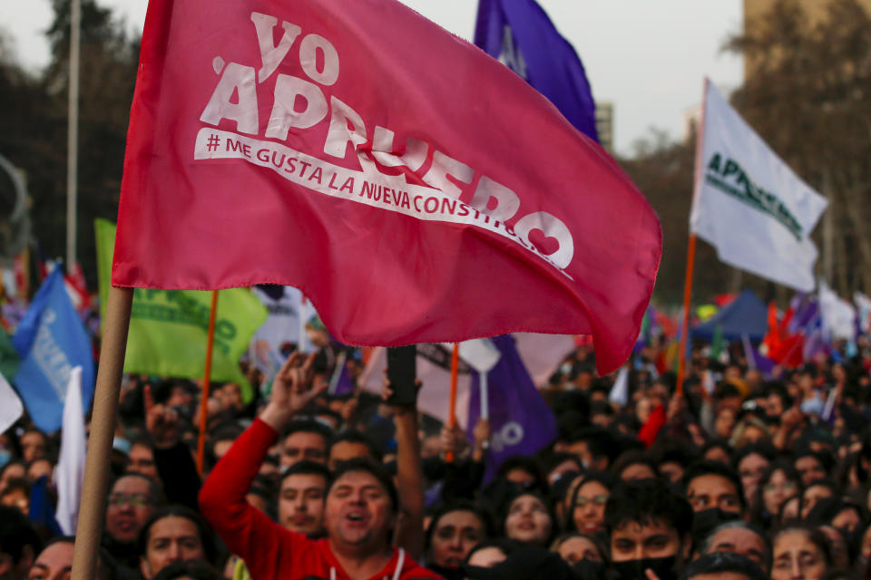 Demonstrators attend a rally in favor of the proposed new Constitution in Santiago, Chile, Thursday, Sept. 1, 2022. Chileans have until the Sept. 4 plebiscite to study the new draft and decide if it will replace the current Magna Carta imposed by a military dictatorship 41 years ago. (AP Photo/Luis Hidalgo)