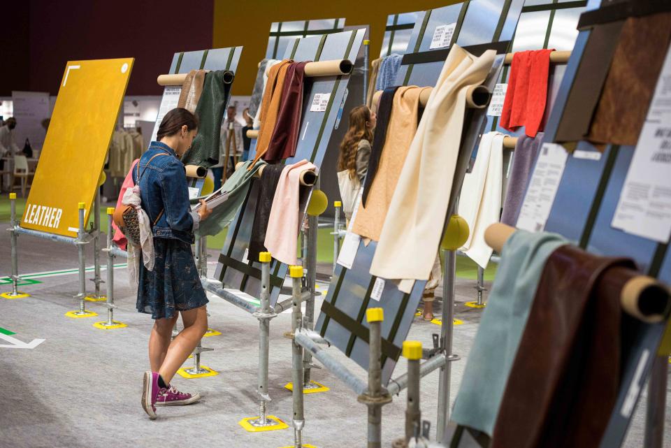 Design teams browsing leather options in the new Eco Innovations Forum. - Credit: Alex Gallosi/Courtest of Premiè