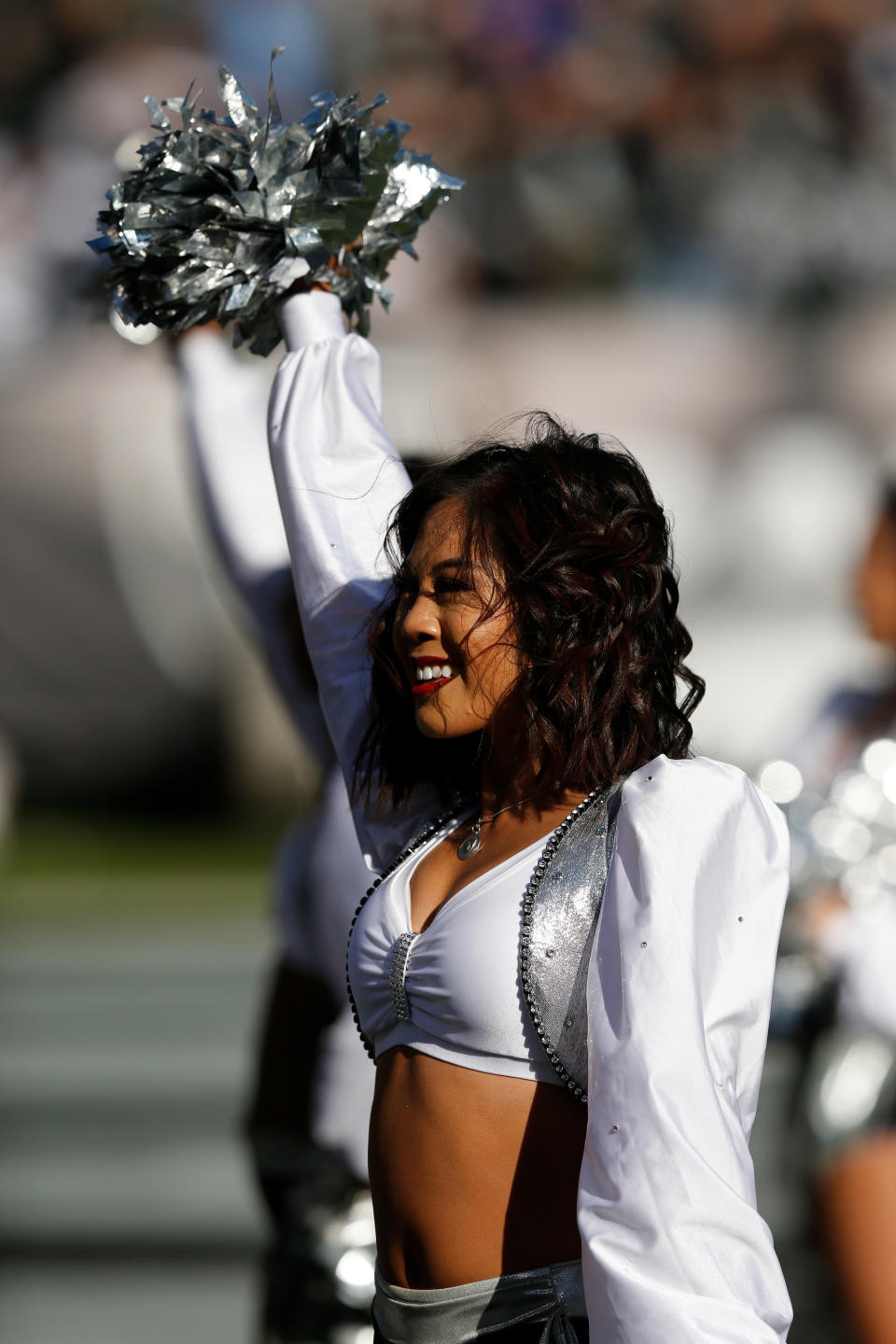 <p>An Oakland Raiders Raiderette performs during their NFL game against the New York Giants at Oakland-Alameda County Coliseum on December 3, 2017 in Oakland, California. (Photo by Lachlan Cunningham/Getty Images) </p>