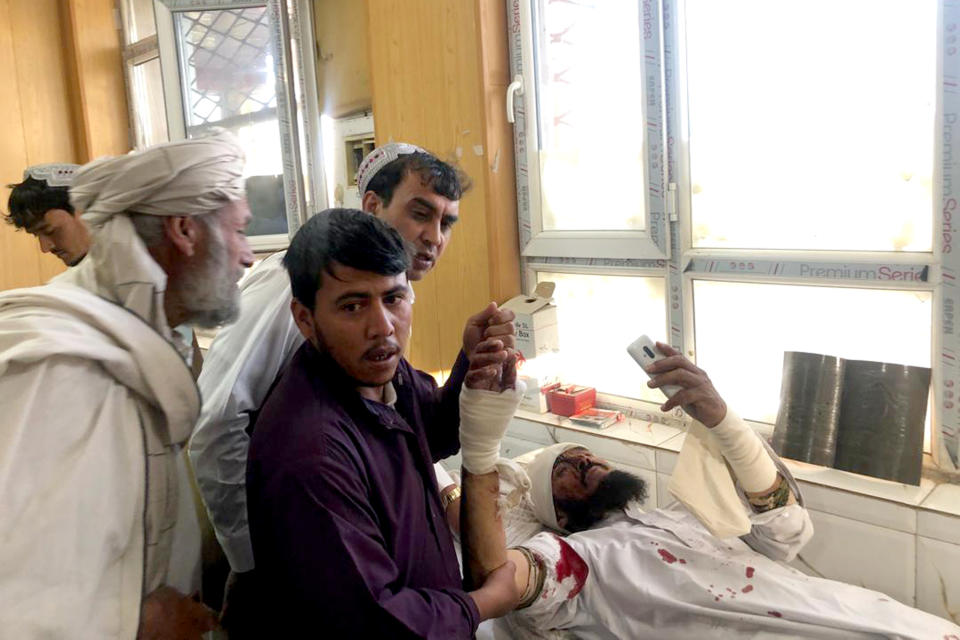 An injured man receives treatment at a hospital after a suicide attack in Zabul, Afghanistan, Thursday, Sept. 19, 2019. A powerful early morning suicide truck bomb devastated a hospital in southern Afghanistan on Thursday. (AP Photo/Ahmad Wali Sarhadi)