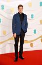 <p>Joe Alwyn added a splash of colour to his look with a blue jacket.</p>