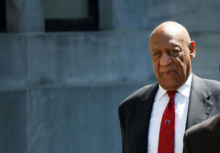Actor and comedian Bill Cosby exits Montgomery County Courthouse after a jury convicted him in a sexual assault retrial in Norristown, Pennsylvania, U.S., April 26, 2018. REUTERS/Brendan McDermid