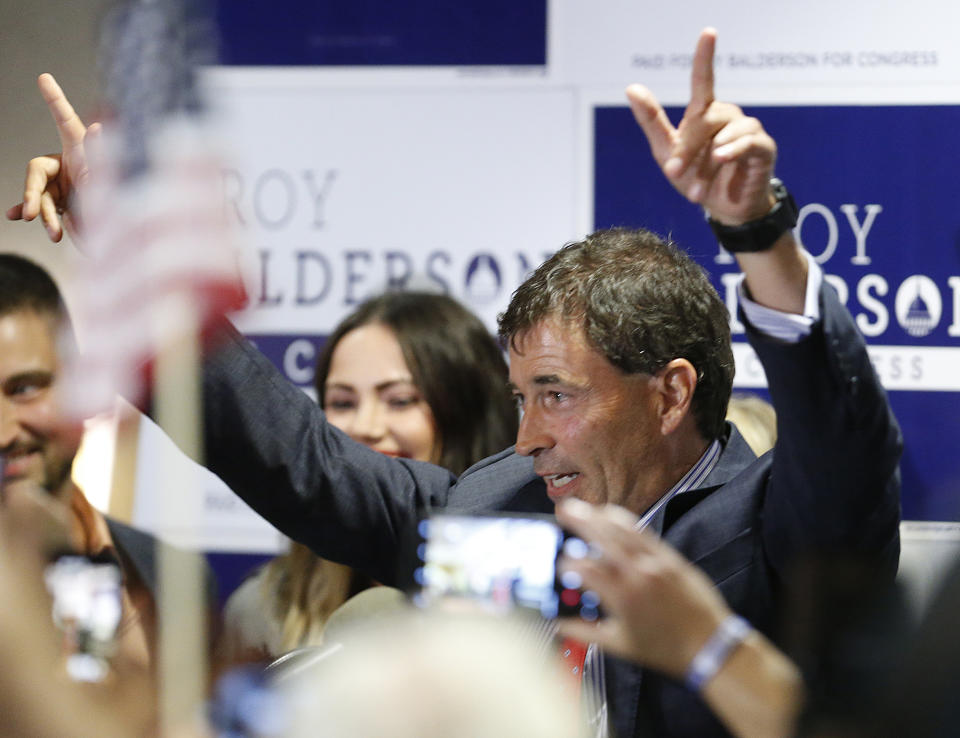 Troy Balderson, Republican candidate for Ohio's 12th Congressional District, greets a crowd of supporters during an election night party Tuesday, Aug. 7, 2018, in Newark, Ohio. (AP Photo/Jay LaPrete)