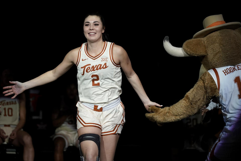 Texas guard Shaylee Gonzales is introduced before an NCAA college basketball game against Kansas State in the the Big 12 Conference tournament Friday, March 10, 2023, in Kansas City, Mo. Find the right balance of business and whimsiness, social media opens the spigot of the NIL revenue stream. (AP Photo/Charlie Riedel)