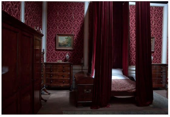 While Rochester might be a man with rough edges, this bedroom is completely decadent (in a bordello)