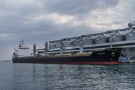 FILE - The ship Navi-Star sits full of grain since Russia's invasion of Ukraine began five months ago as it waits to sail from the Odesa Sea Port, in Odesa, Ukraine, Friday, July 29, 2022. Ukraine is steadily exporting grains from its Black Sea ports under a wartime deal brokered last month, but the agreement has also proven helpful to Russian farmers and the country's cornerstone agriculture industry. (AP Photo/David Goldman, File)