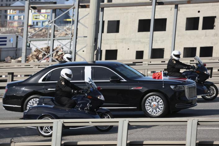 Chinese President Xi Jinping's motorcade drives from the Vnukovo-2 government airport outside Moscow, Russia, Monday, March 20, 2023. (AP Photo)