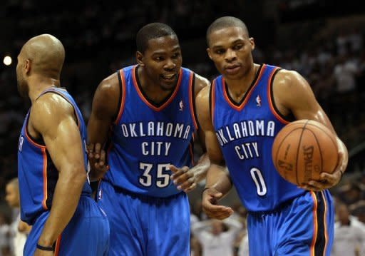 Oklahoma City Thunder's Kevin Durant (C) and Russell Westbrook (R) during game five of their NBA Western Conference Finals against the San Antonio Spurs on June 4. The Thunder and Miami Heat begin the best-of-seven championship series at Oklahoma City on Tuesday