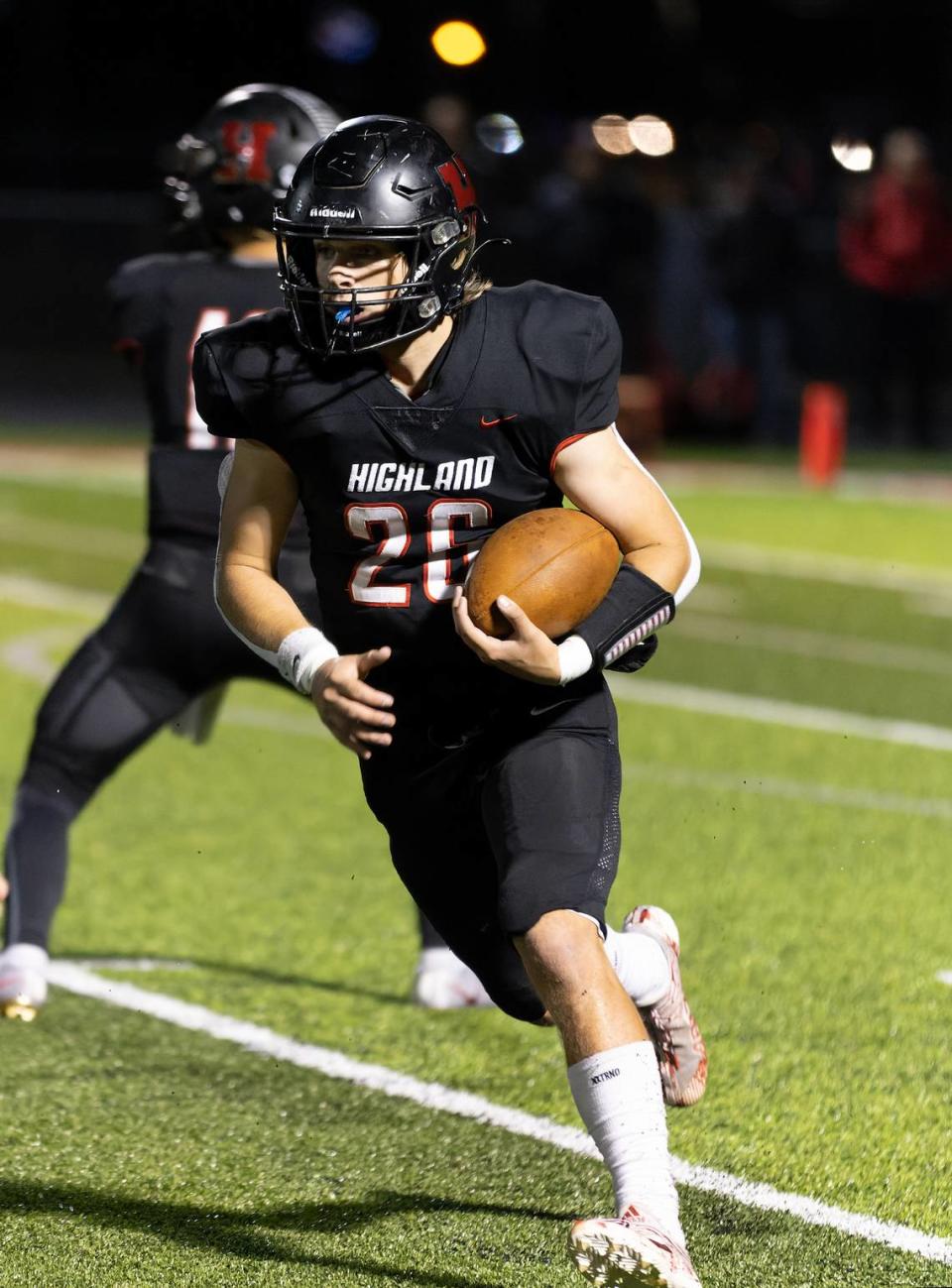 Highland High School’s Travis Porter carries the ball during a 35-0 win against Triad on Sept. 23. For the second time this fall, Porter is the winner of the Belleville News-Democrat Player of the Week high school poll, as selected by readers of bnd.com.